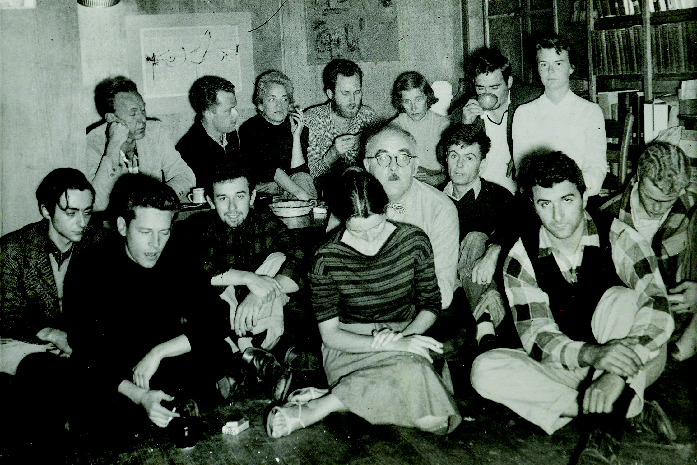 Community gathering to announce the closing of the college. Front (l to r): Eric Weinberger, Dan Rice, Basil King, Betty Olson, Charles Olson, Harvey Frauenglass, Dita Frauenglass, Joseph Fiore, Ebbe Borregaard. Back: Wesley Huss, unidentified, Eloise Mixon, Don Mixon, Ann Simone, Robert Hawley, unidentified. Photographer Unknown.