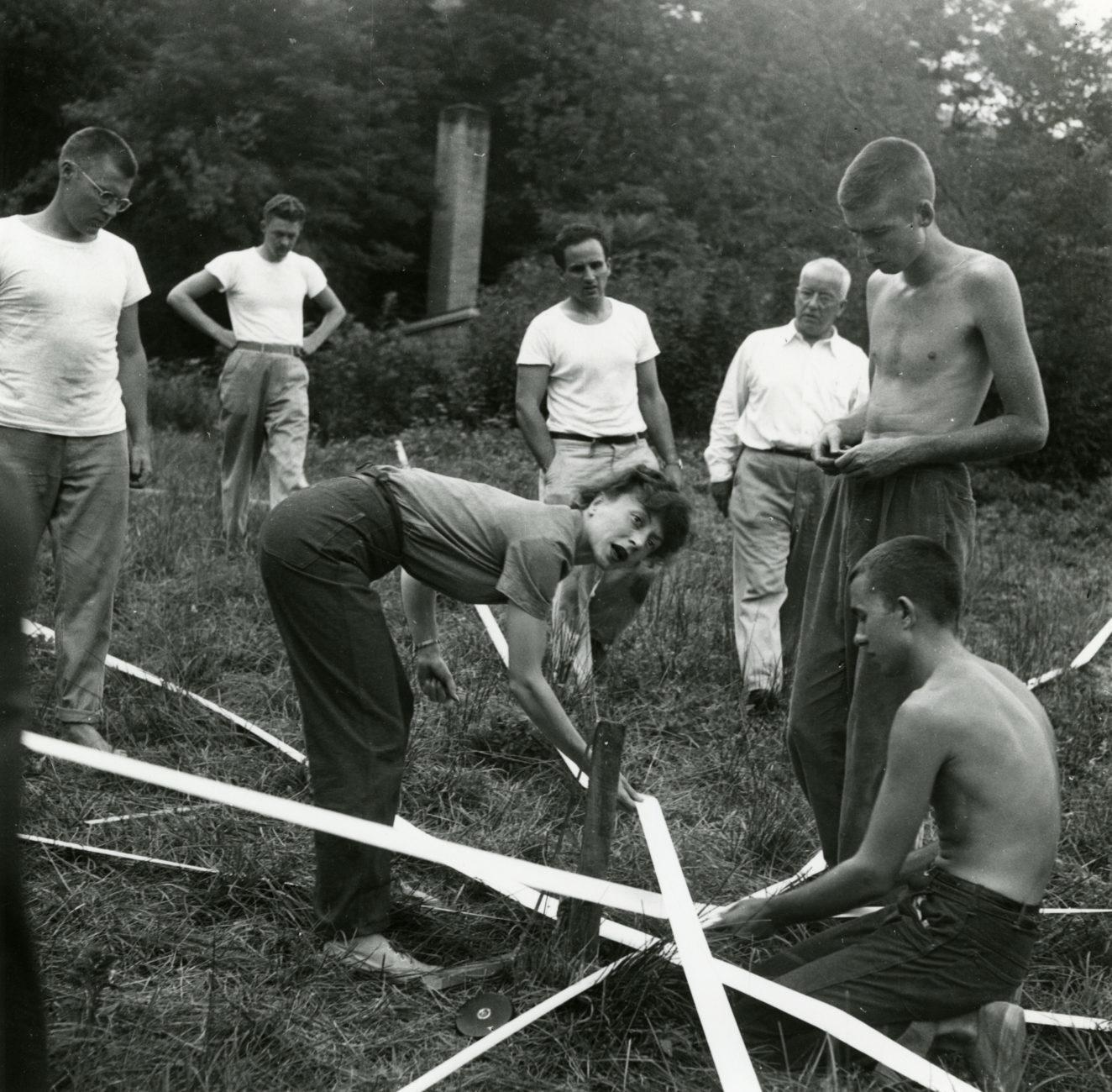 Elaine de Kooning (center), R. Buckminster Fuller, Ray Johnson, Albert Lanier, and others with the Supine Dome, 1948.